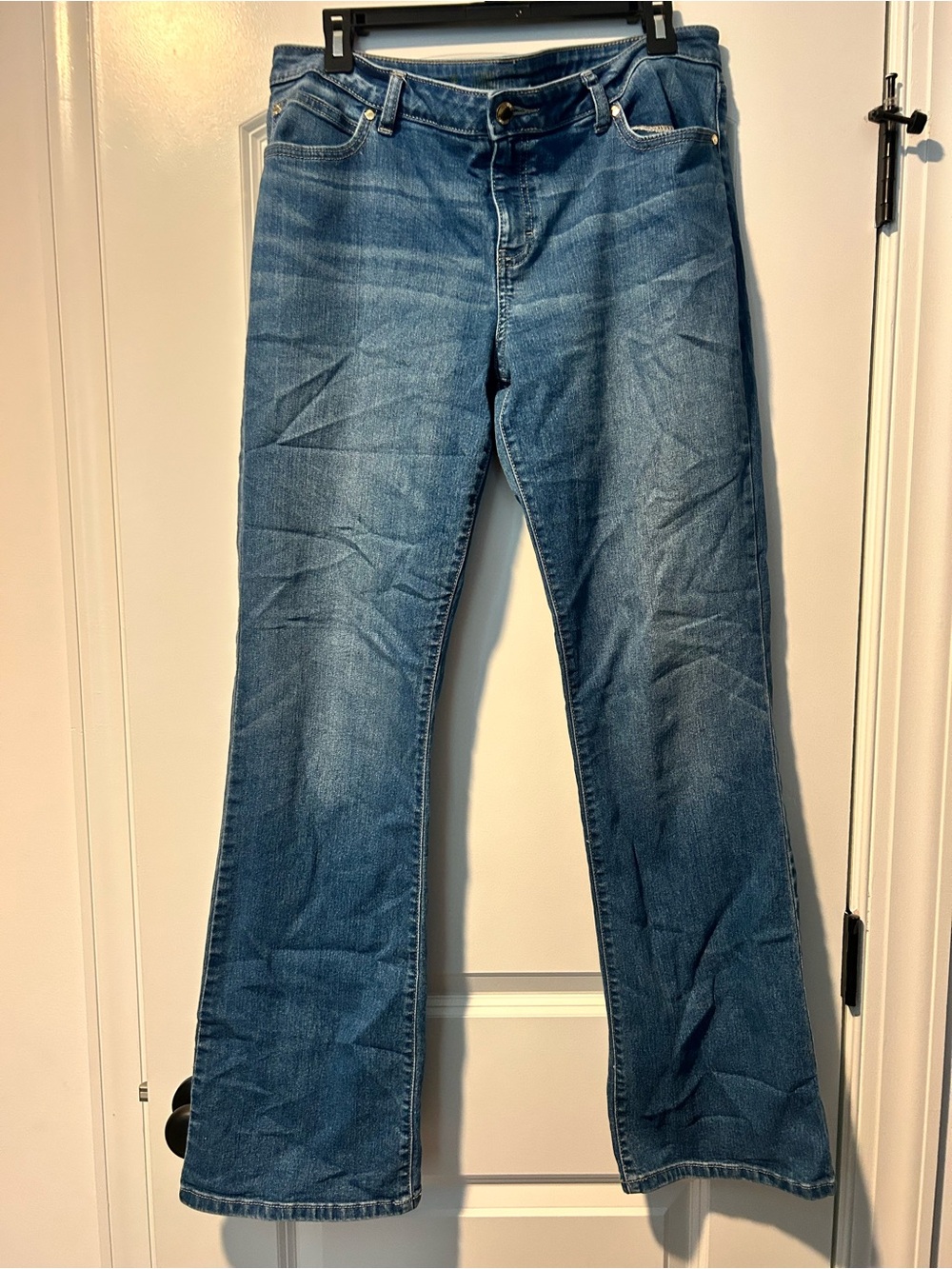 Jennifer Lopez medium blue flared denim jeans